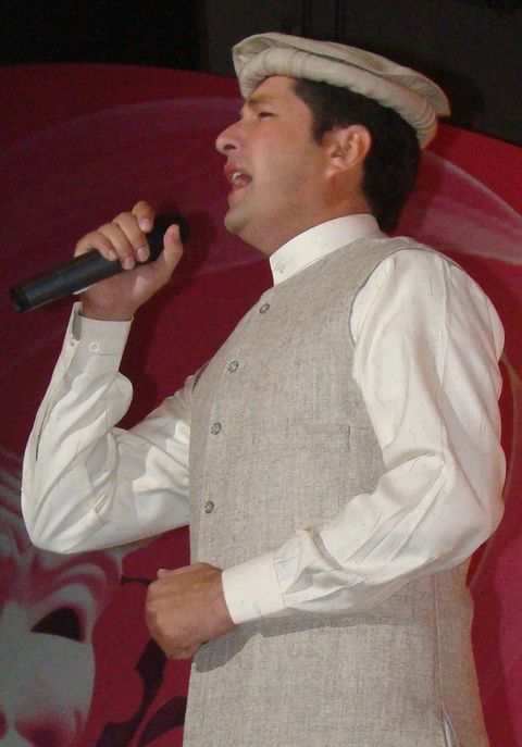 Bakhtiar Khattak performing on stage early in his career